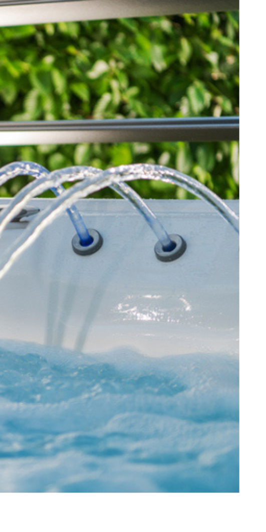 Image of a hot tub with three streams of water fountains.